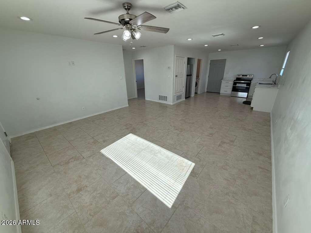 1134 East 23rd Street Douglas, AZ 85607 - Photo 2 of 17 an entryway with ceiling fan