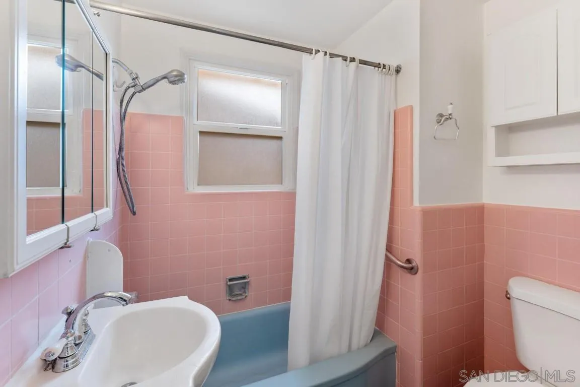 155 Willowside Terrace Alpine, CA 91901 - Photo 19 of 38 a bathroom with a sink toilet and shower