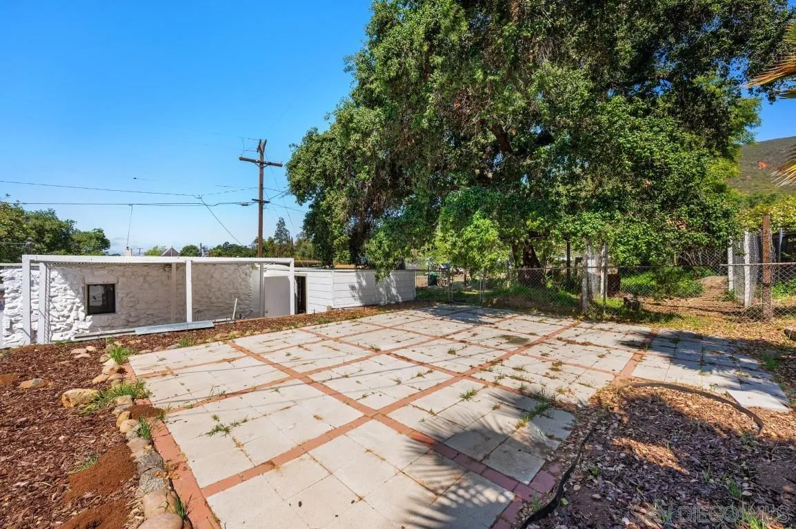 155 Willowside Terrace Alpine, CA 91901 - Photo 30 of 38 a backyard of a house with table and chairs