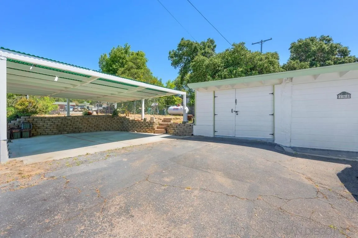155 Willowside Terrace Alpine, CA 91901 - Photo 6 of 38 a view of garage with a small yard