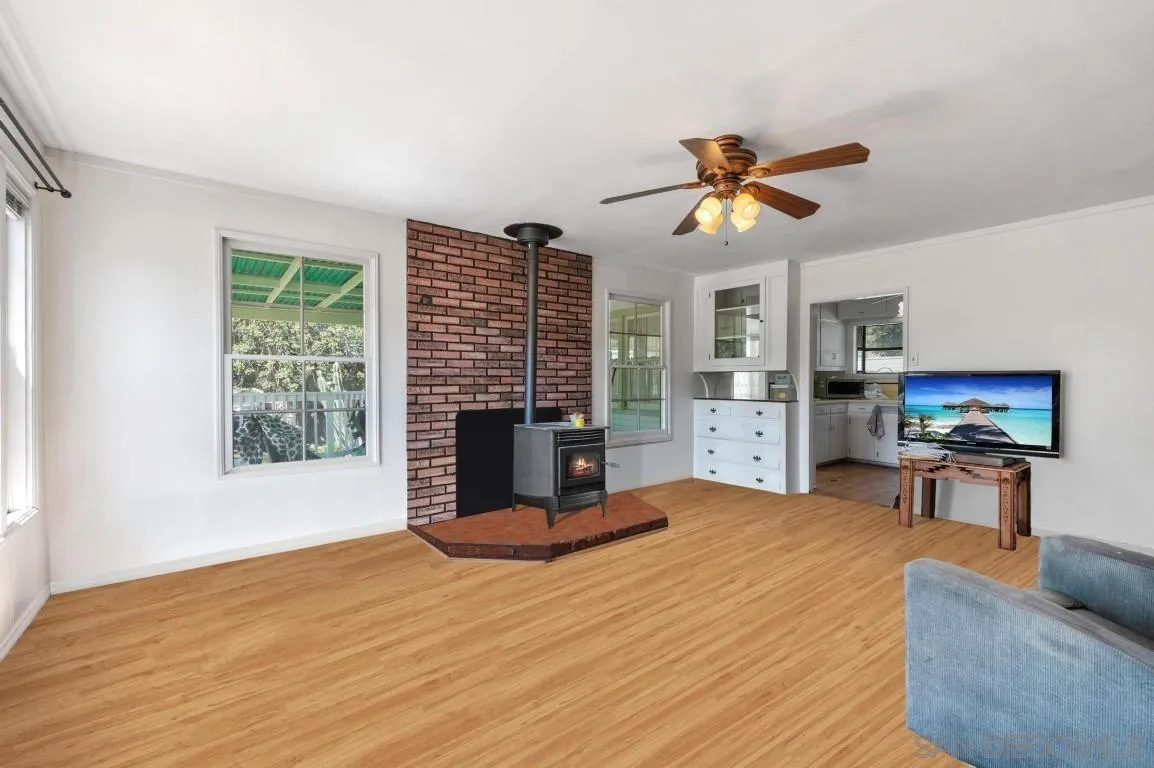 155 Willowside Terrace Alpine, CA 91901 - Photo 7 of 38 a view of a livingroom with furniture workspace and a window