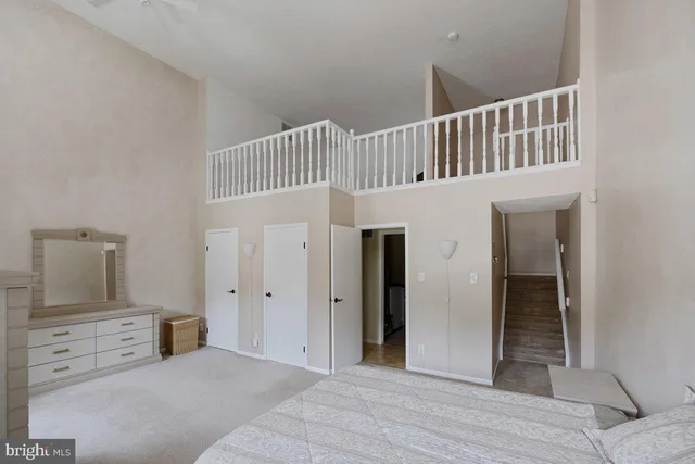 a view of an empty room with a fireplace