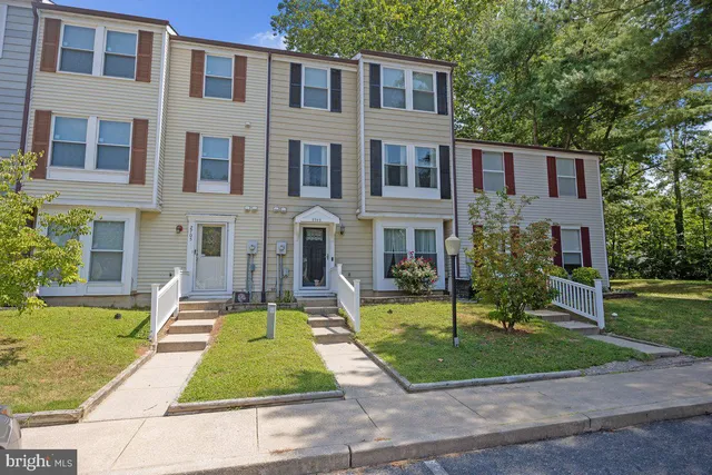 a front view of a building with street view