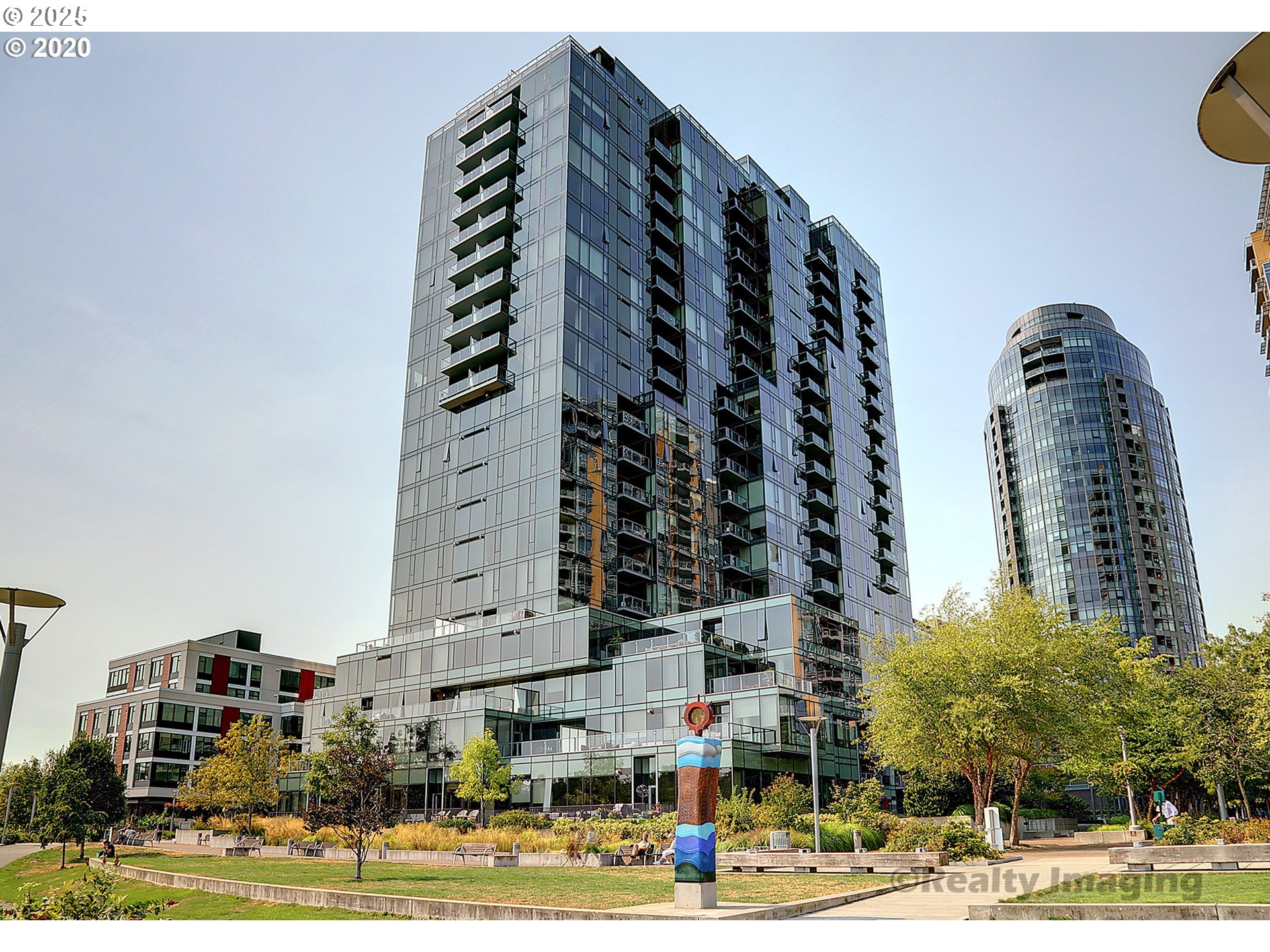 841 Southwest Gaines Street, Unit 319 Portland, OR 97239 - Photo 1 of 44 a view of a tall building