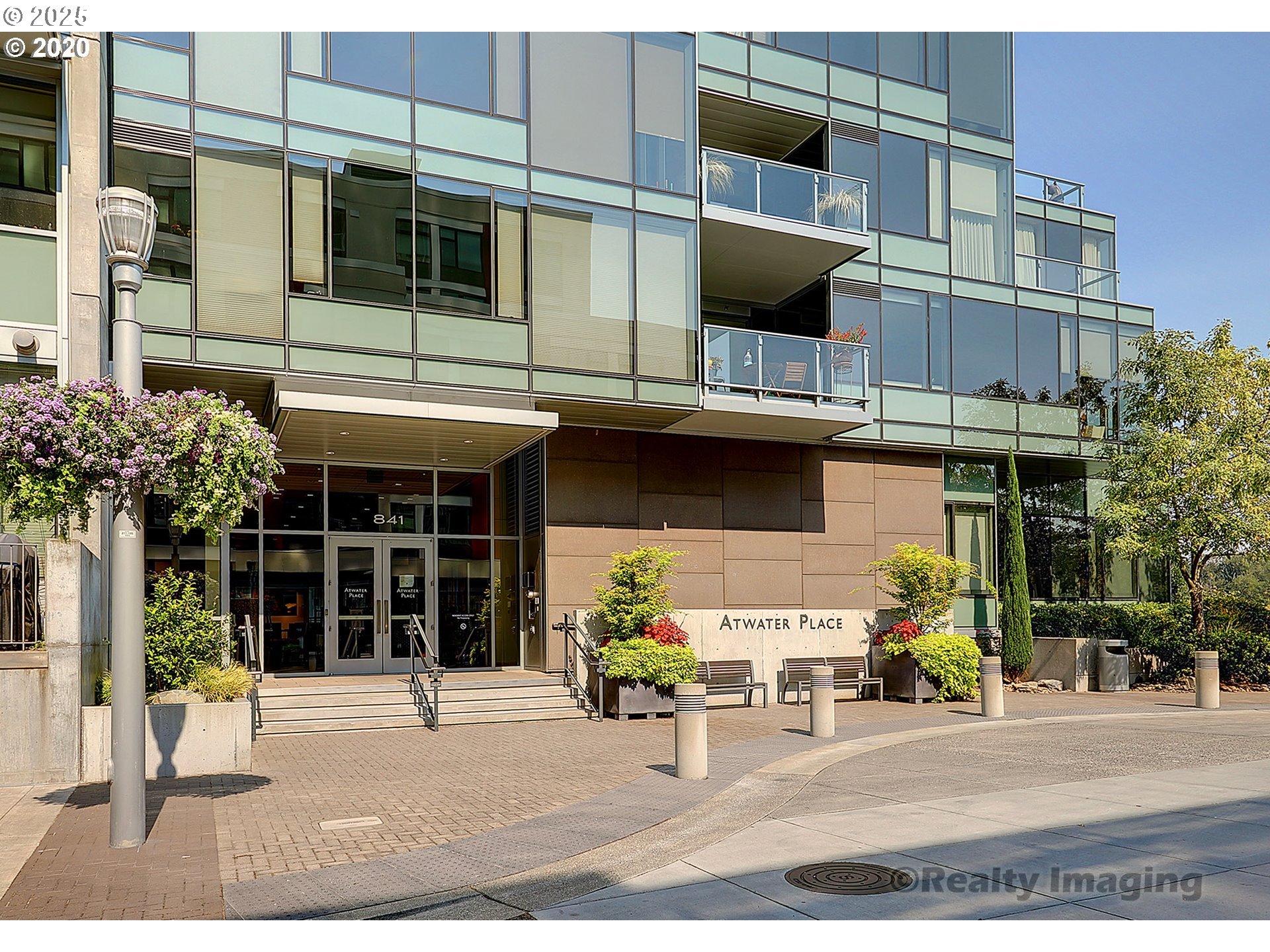 841 Southwest Gaines Street, Unit 319 Portland, OR 97239 - Photo 2 of 44 a view of a building with a window and balcony