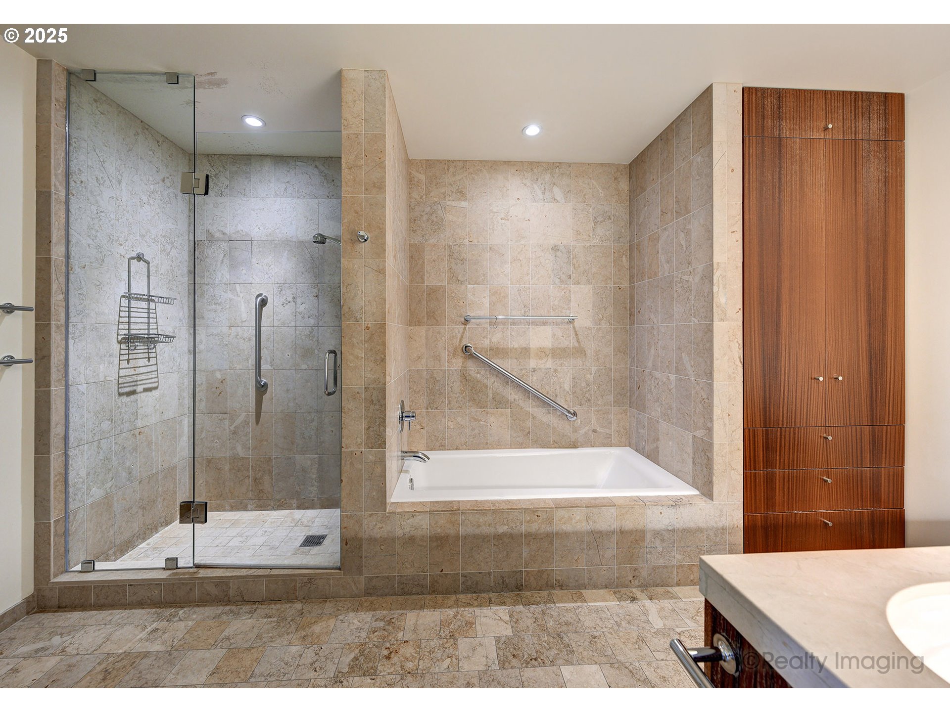 841 Southwest Gaines Street, Unit 319 Portland, OR 97239 - Photo 23 of 44 a bathroom with a bathtub and a shower
