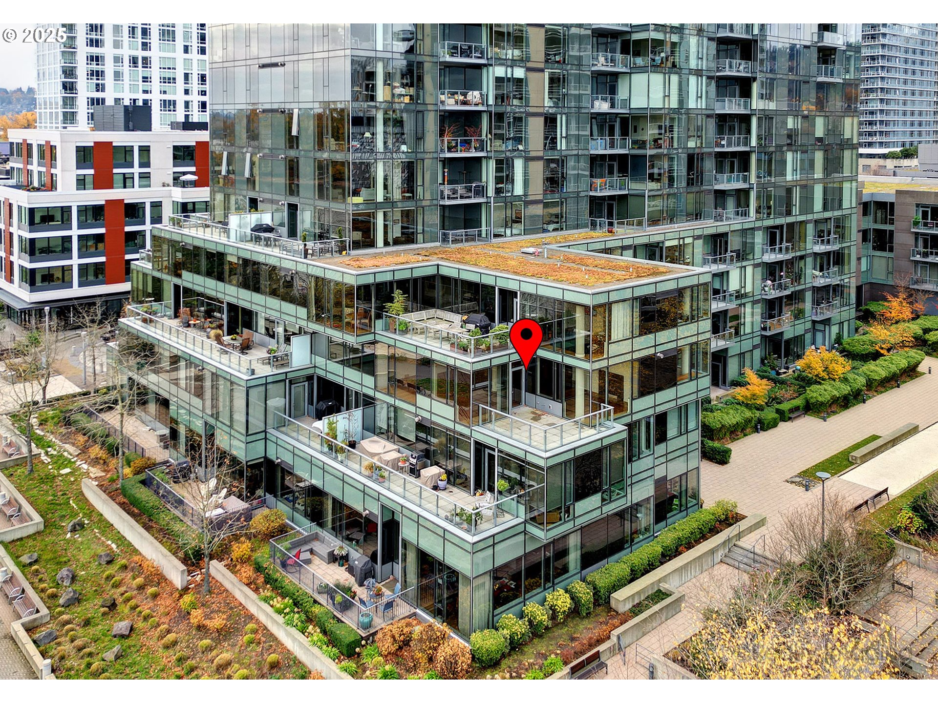 841 Southwest Gaines Street, Unit 319 Portland, OR 97239 - Photo 35 of 44 a building view with tall trees