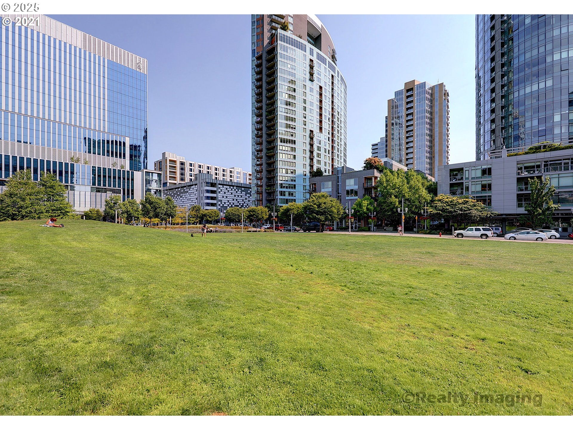 841 Southwest Gaines Street, Unit 319 Portland, OR 97239 - Photo 44 of 44 a view of a building and yard with green space