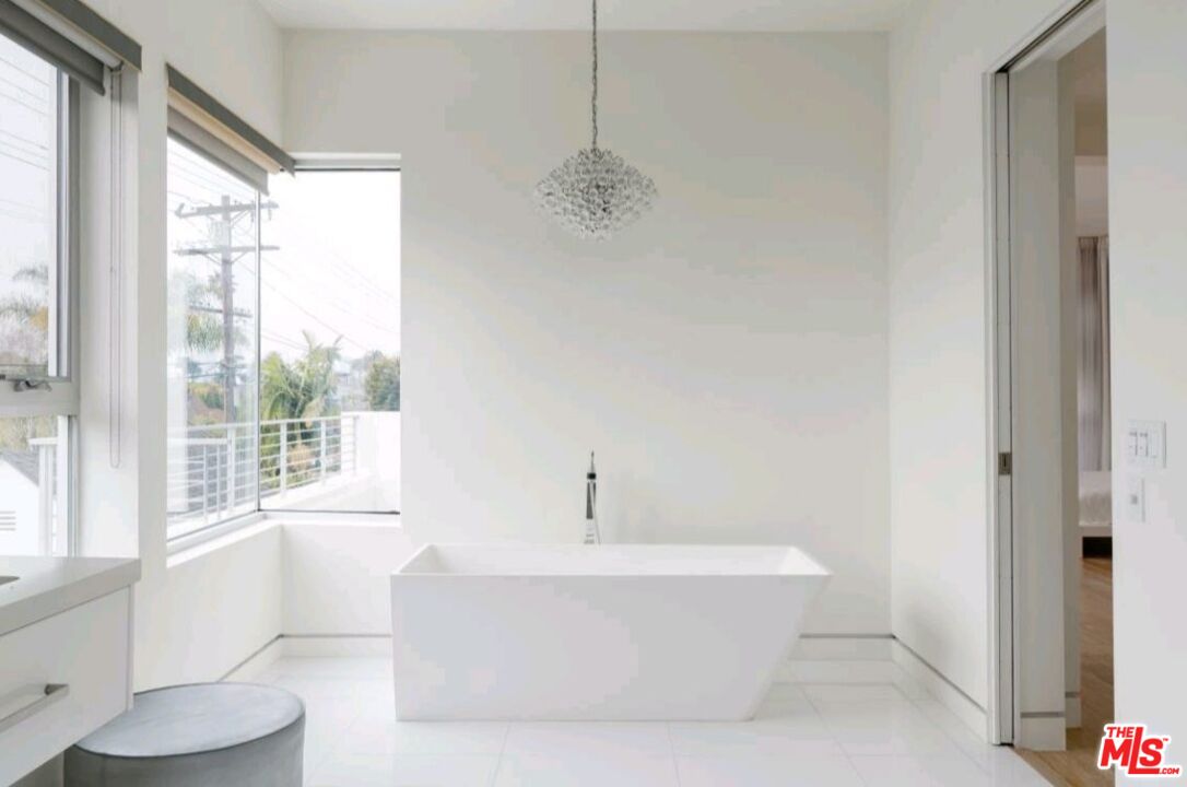 6620 West 5th Street Los Angeles, CA 90048 - Photo 14 of 34 a white bath tub sitting next to a window