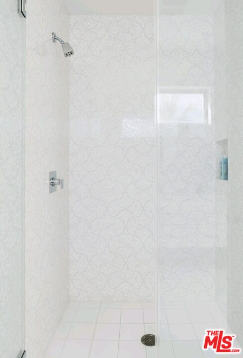 6620 West 5th Street Los Angeles, CA 90048 - Photo 28 of 34 a bathroom with a shower