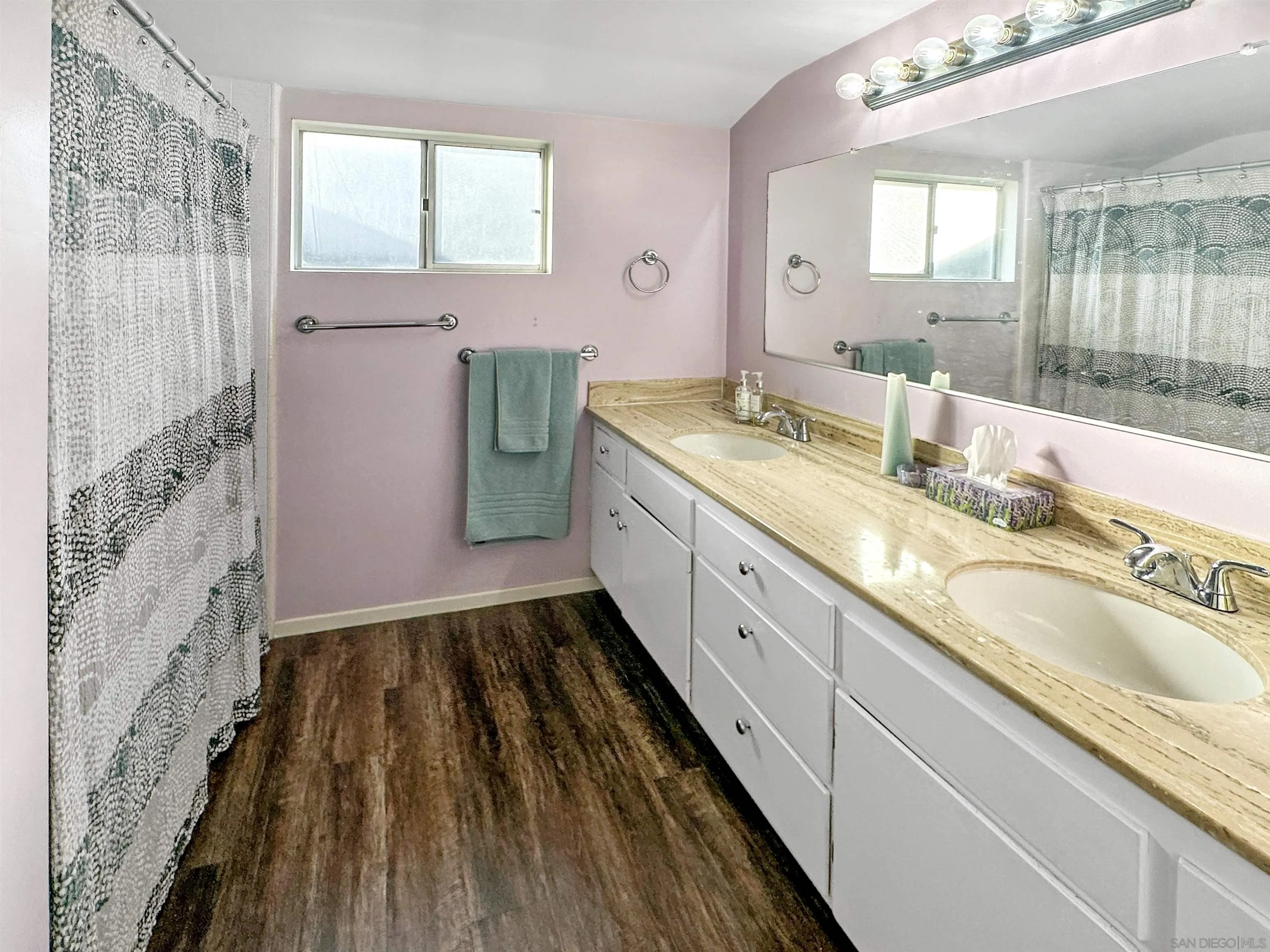 1704 Mudge Lane Escondido, CA 92026 - Photo 13 of 13 a bathroom with a granite countertop sink and a mirror