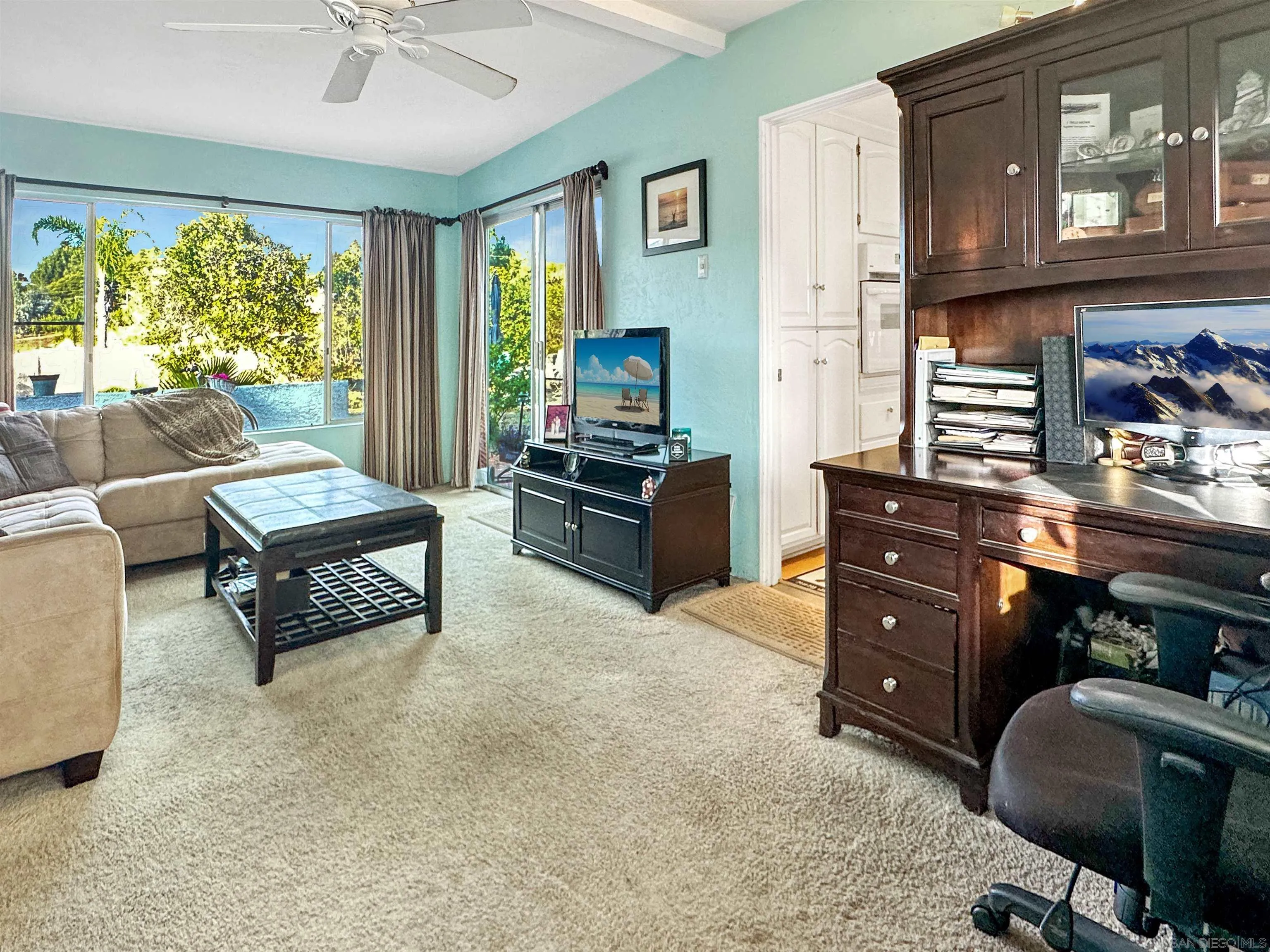 1704 Mudge Lane Escondido, CA 92026 - Photo 8 of 13 a living room with furniture and a flat screen tv