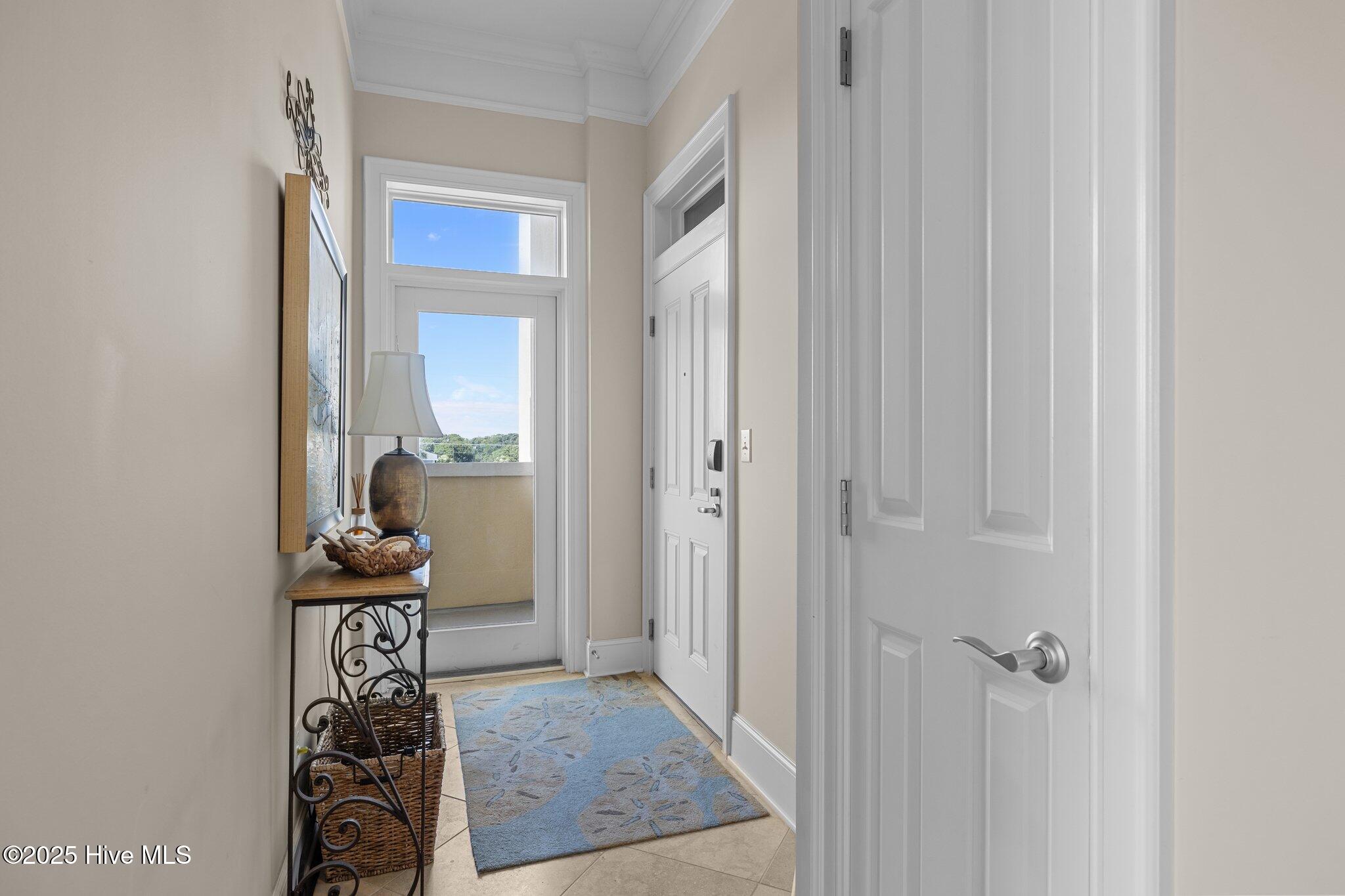 1435 Salter Path Road, Unit M1 Indian Beach, NC 28512 - Photo 27 of 62 Entry door and north terrace door