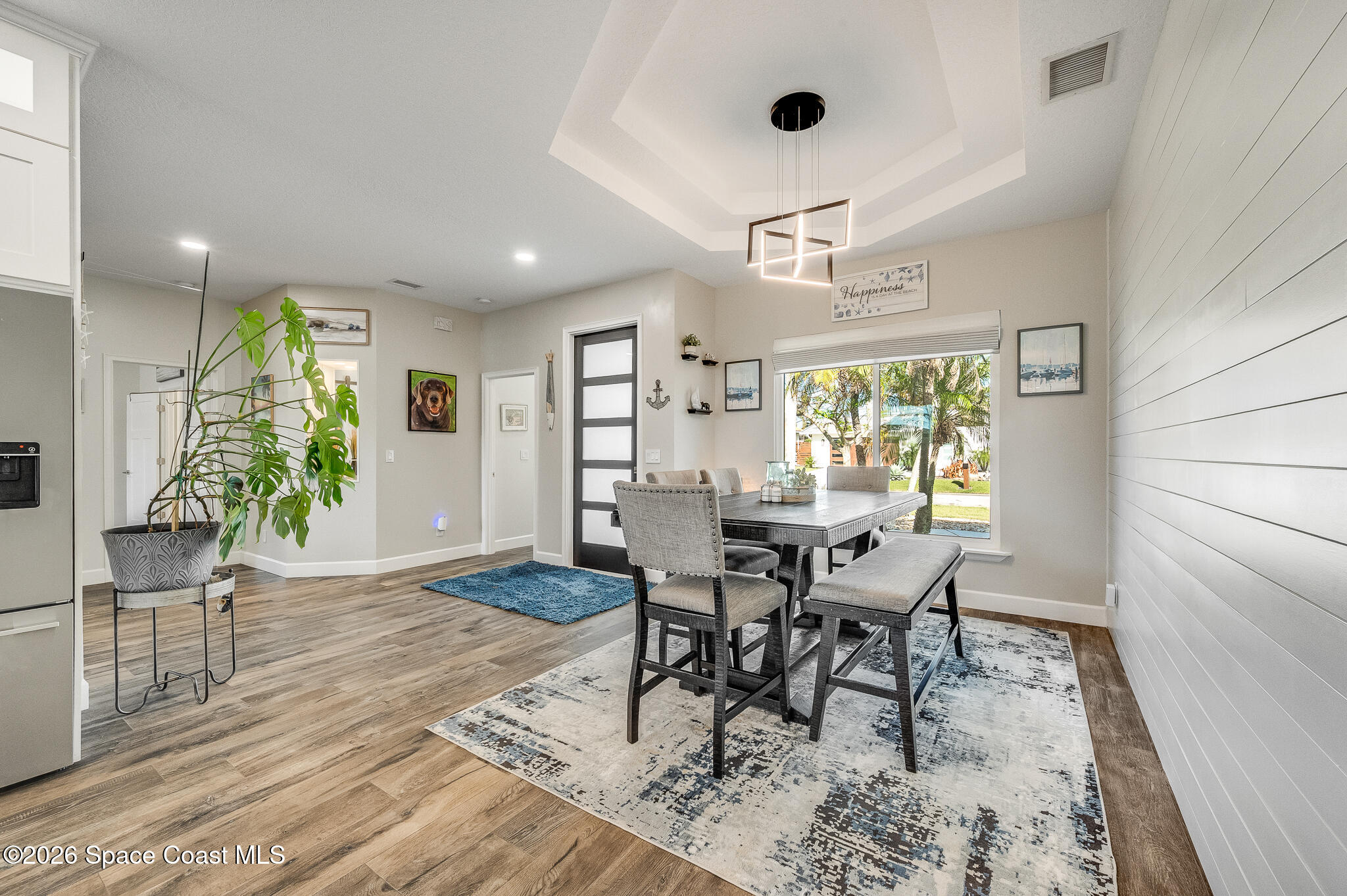 447 Sandy Key Melbourne Beach, FL 32951 - Photo 15 of 94 a view of a dining room with furniture and window