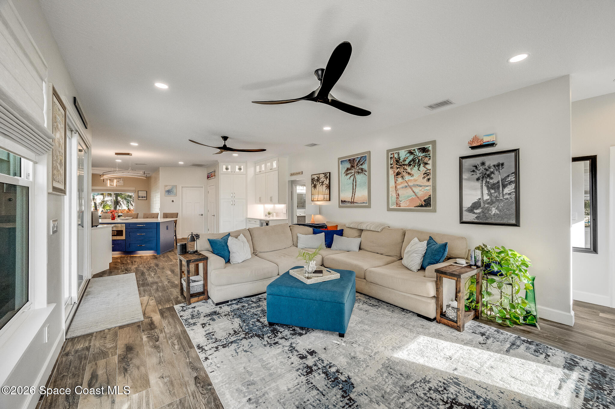 447 Sandy Key Melbourne Beach, FL 32951 - Photo 35 of 94 a living room with furniture and a large window