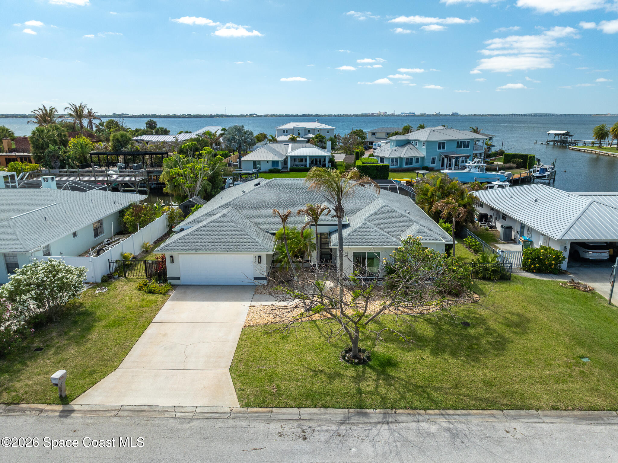447 Sandy Key Melbourne Beach, FL 32951 - Photo 53 of 94 an aerial view of a house with a yard