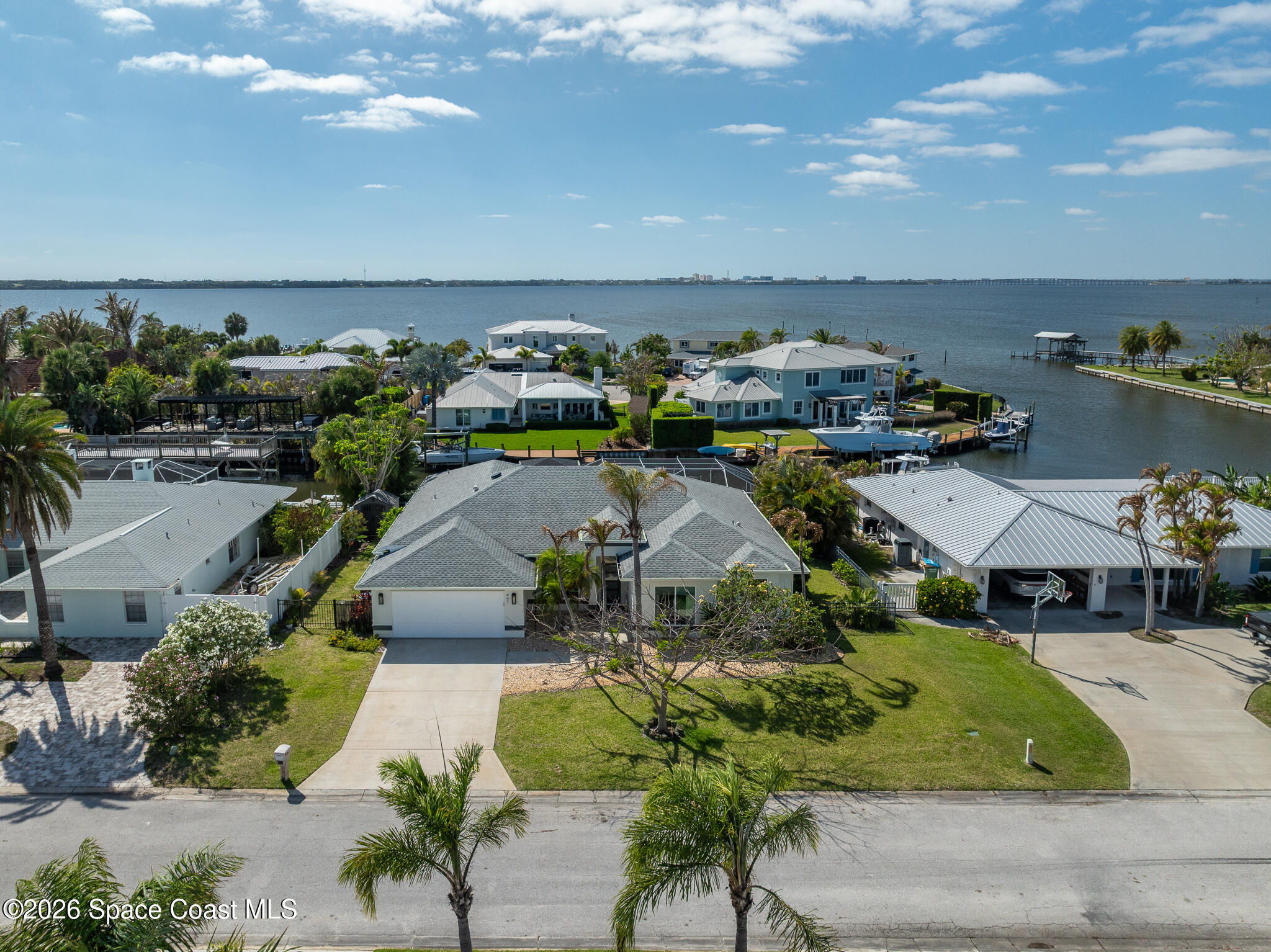 447 Sandy Key Melbourne Beach, FL 32951 - Photo 90 of 94 an aerial view of a house with a garden