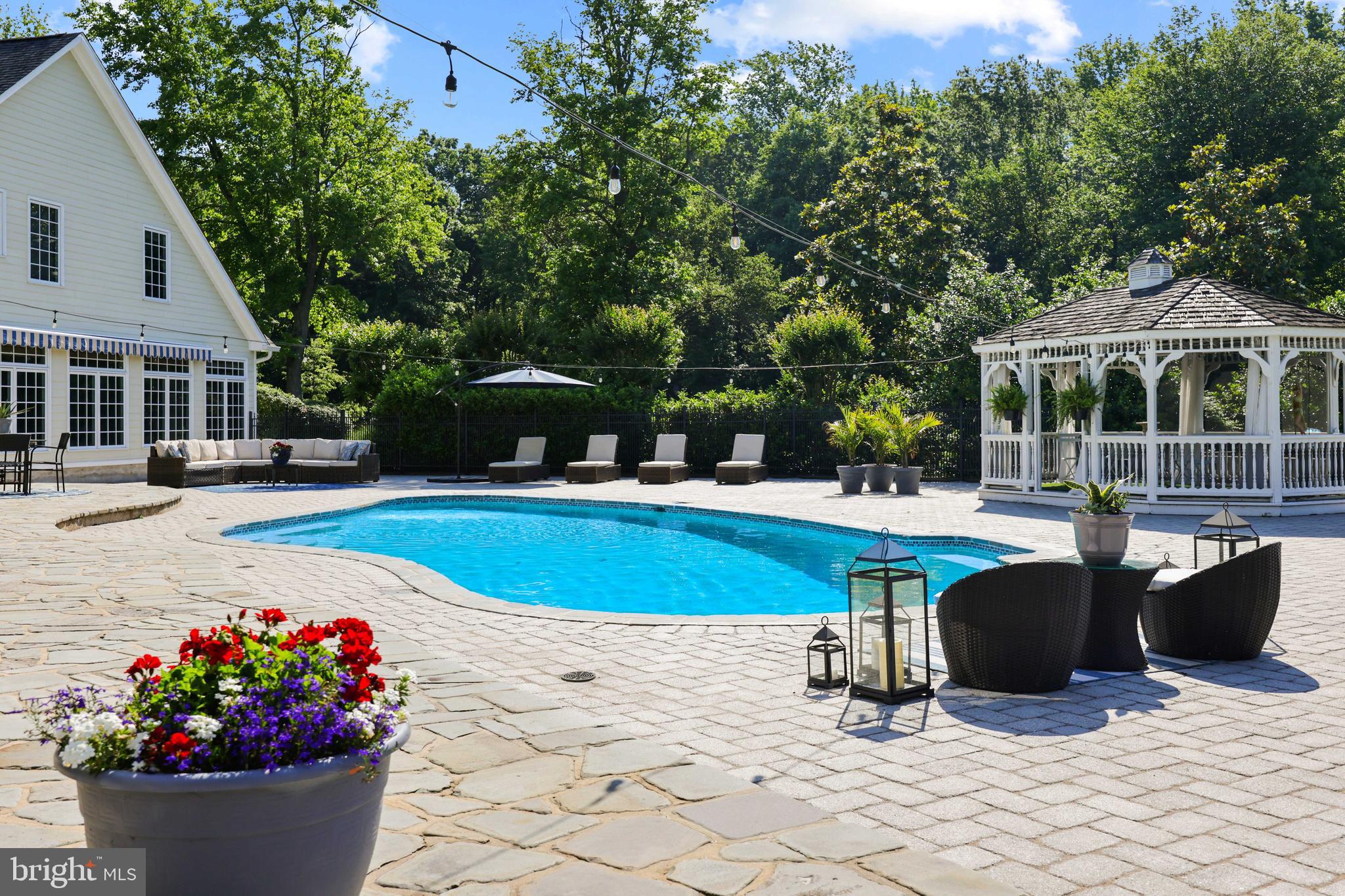 3054 Rundelac Road Annapolis, MD 21403 - Photo 16 of 38 Relax around the waterside pool