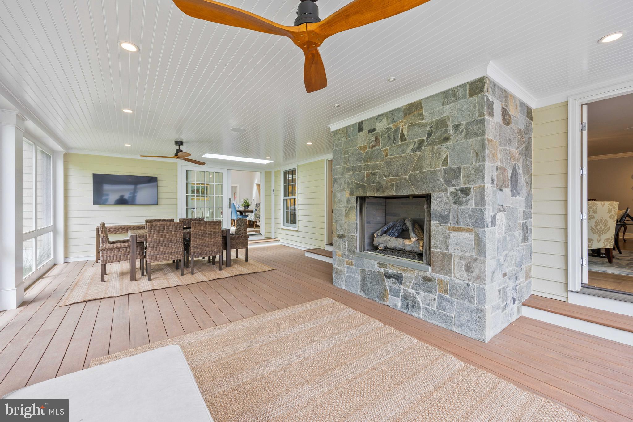 3054 Rundelac Road Annapolis, MD 21403 - Photo 10 of 38 Screened porch with fireplace