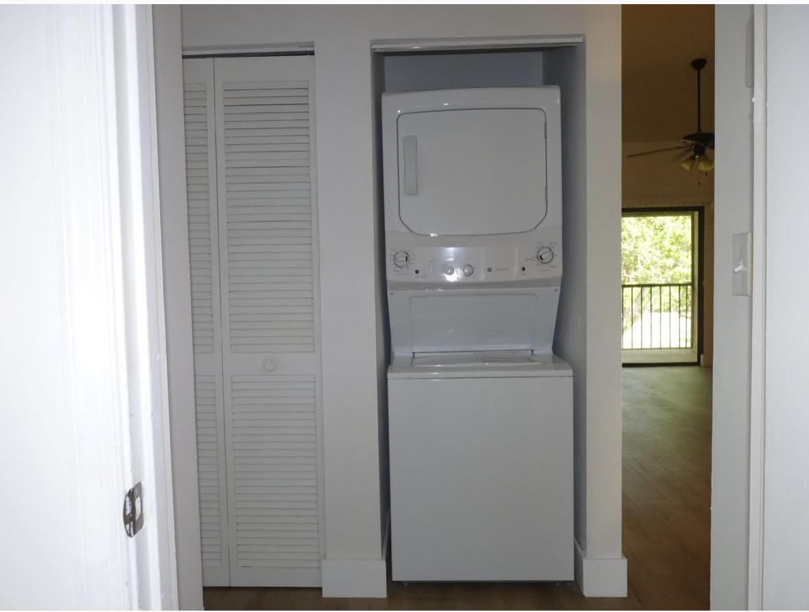 3130 Millwood Terrace, Unit 2120 Boca Raton, FL 33431 - Photo 8 of 15 a bathroom with a toilet