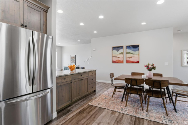 370 West Knights Lane Layton, UT 84041 - Photo 10 of 31 Open-concept living space with wood-finish flooring, recessed lighting, and light gray walls