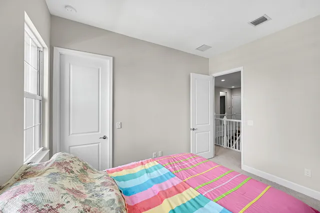 a view of a swimming pool with lounge chairs