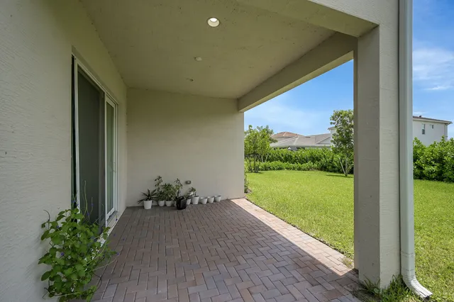 a view of a car park in front of house