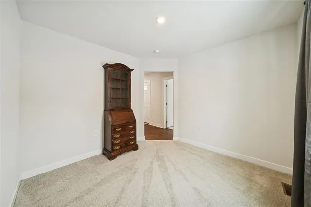 a view of a livingroom with wooden floor