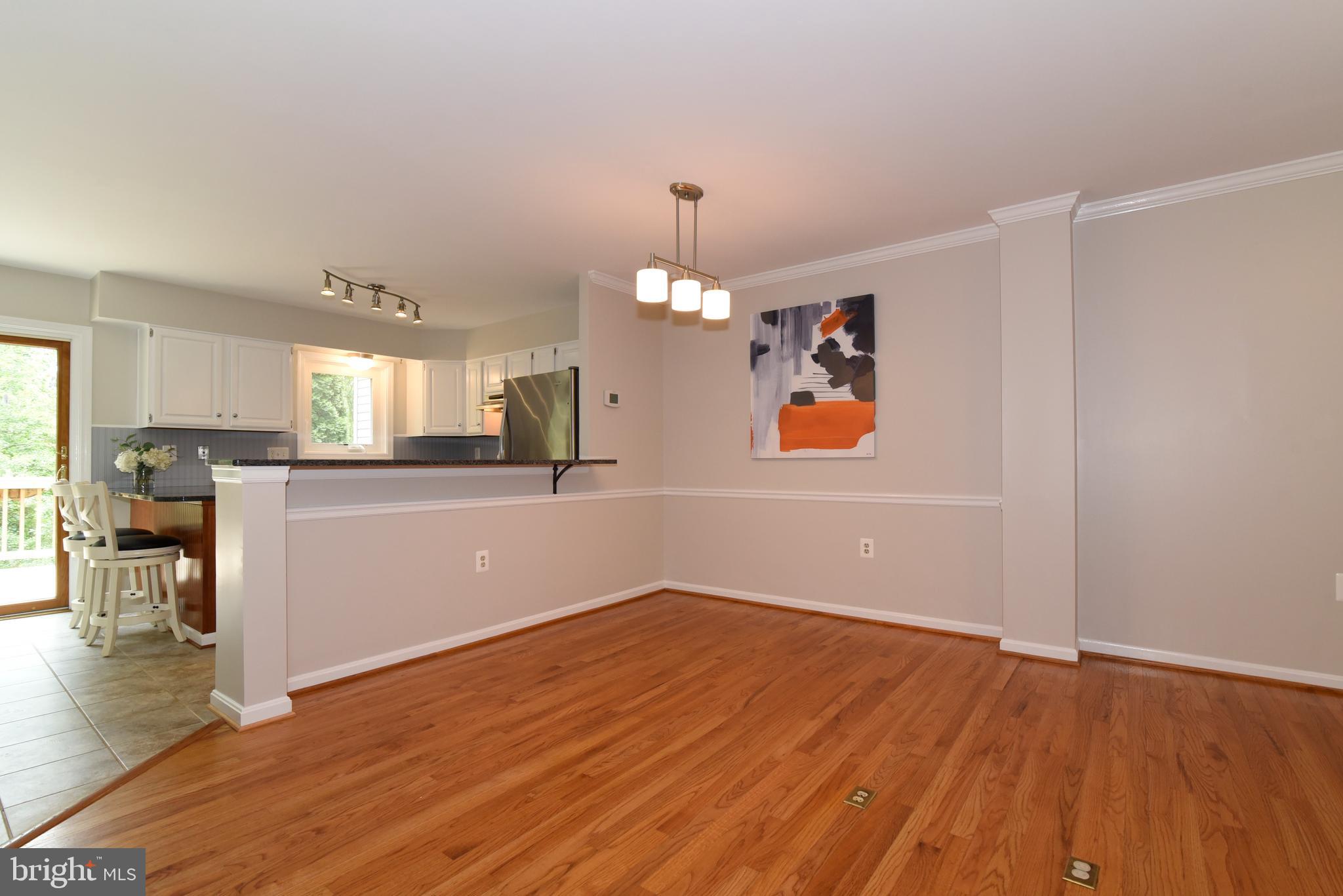 11940 Sentinel Point Court Reston, VA 20191 - Photo 11 of 43 Dining Room with chair rail mouldings.
