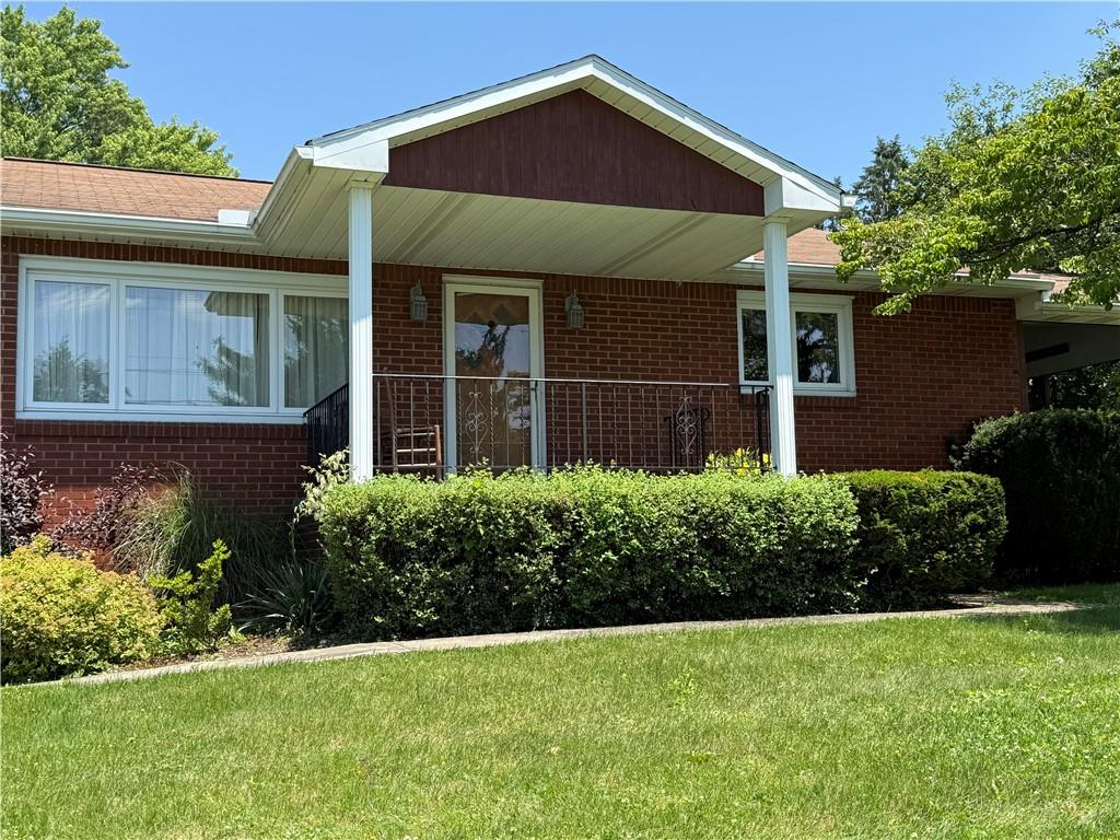 2801 7th Street Road New Kensington, PA 15068 - Photo 1 of 22 a front view of a house with a yard