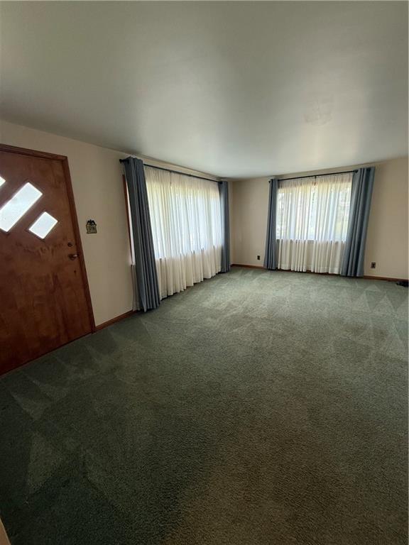 2801 7th Street Road New Kensington, PA 15068 - Photo 18 of 22 an empty room with a window and stairs