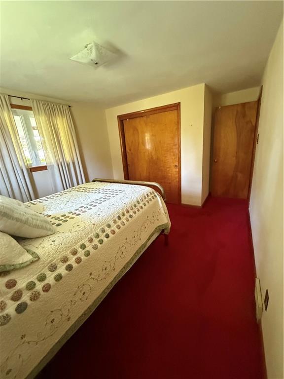 2801 7th Street Road New Kensington, PA 15068 - Photo 9 of 22 a bedroom with a bed and wooden floor