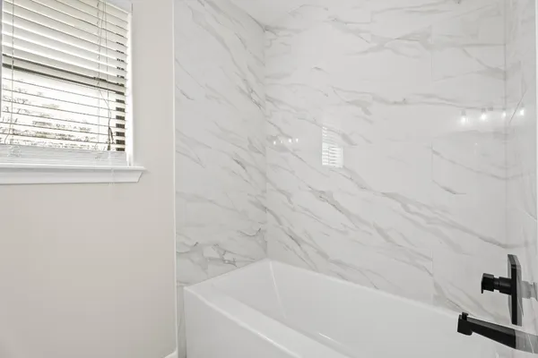 a bathroom with a bathtub