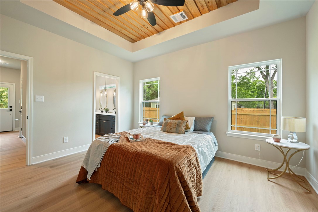 804 East 27th Street Bryan, TX 77803 - Photo 16 of 21 a bedroom with a bed and a window