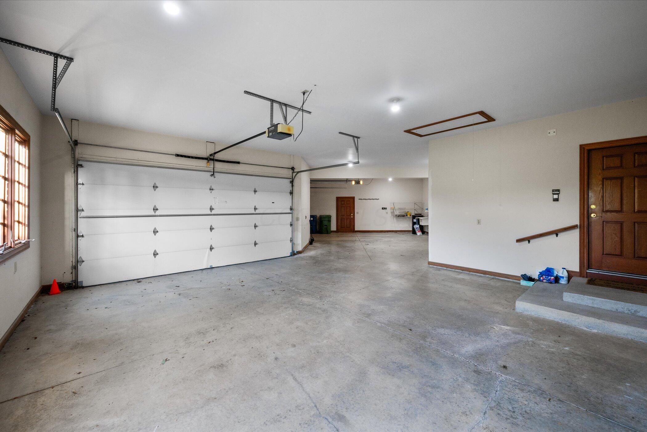 18261 Boerger Road Marysville, OH 43040 - Photo 78 of 94 Check out this huge garage - features access door and sink!