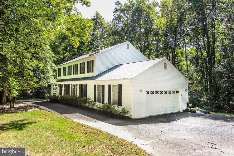 2600 Penny Royal Lane Reston, VA 20191 - Photo 2 of 30 a view of a house with pool and sitting area