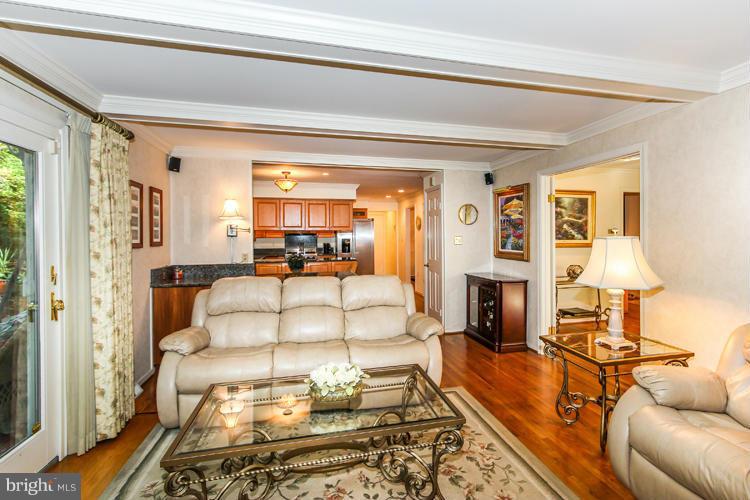 2600 Penny Royal Lane Reston, VA 20191 - Photo 13 of 30 a living room with furniture fireplace and a table