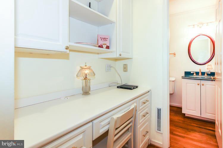 2600 Penny Royal Lane Reston, VA 20191 - Photo 17 of 30 a kitchen with a sink and a stove top oven