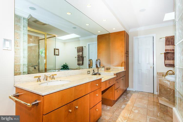 2600 Penny Royal Lane Reston, VA 20191 - Photo 24 of 30 a bathroom with a sink double vanity and a mirror