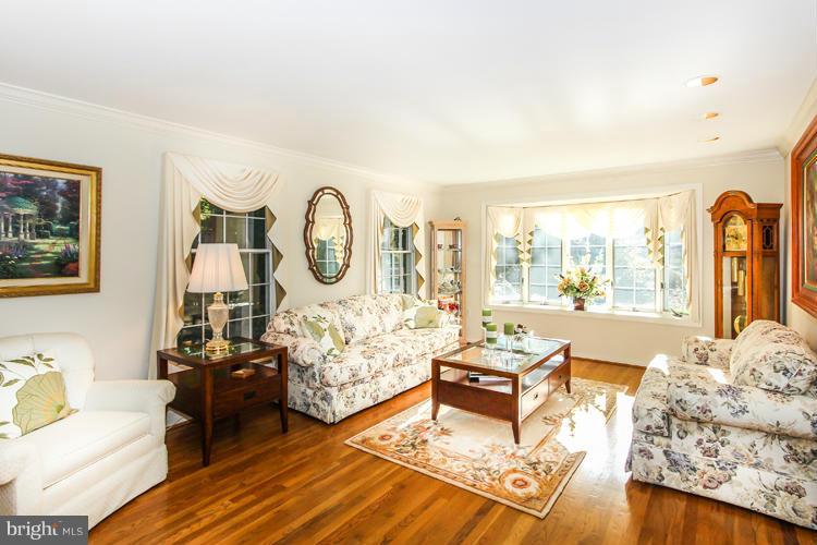 2600 Penny Royal Lane Reston, VA 20191 - Photo 8 of 30 a living room with fireplace furniture and a large window