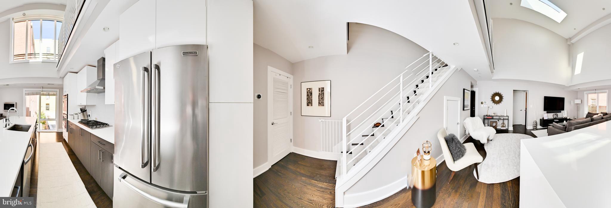 2012 Kalorama Road Northwest, Unit 8 Washington, DC 20009 - Photo 18 of 45 a view of an entryway with staircase and wooden floor