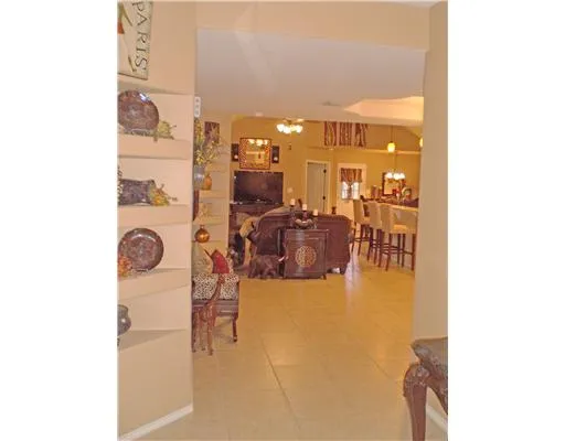 a view of a living room with furniture