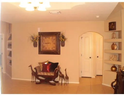 a view of a workspace with furniture