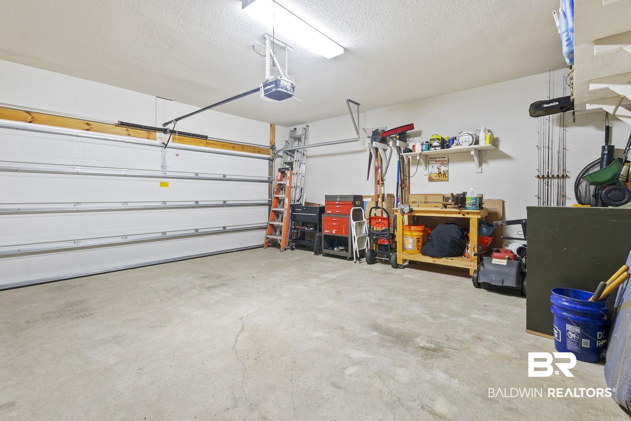 31663 Kestrel Loop Daphne, AL 36527 - Photo 48 of 86 Garage featuring a garage door opener