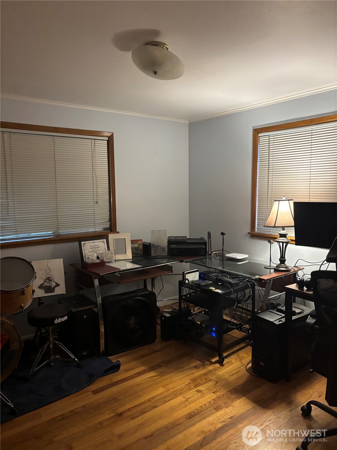 22010 Brier Road Brier, WA 98036 - Photo 14 of 34 a view of a workspace with furniture and wooden floor
