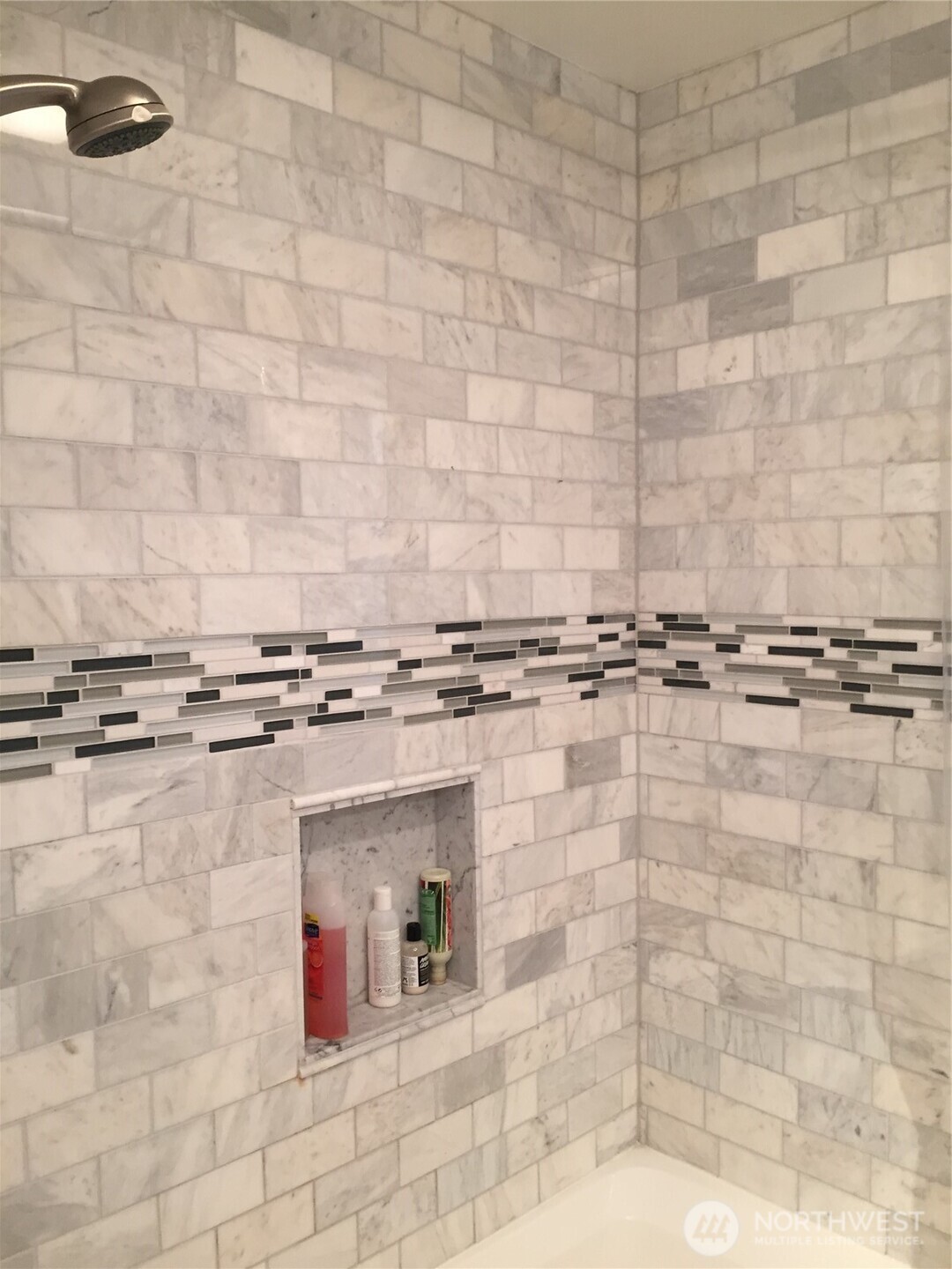 22010 Brier Road Brier, WA 98036 - Photo 16 of 34 a room with granite countertop a white wall and a stove