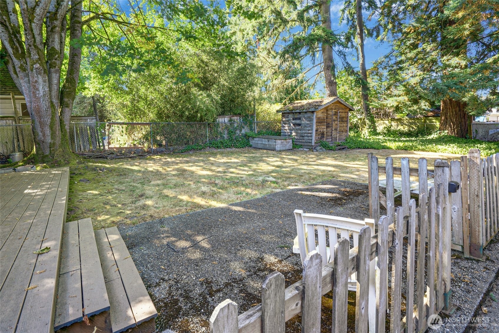 22010 Brier Road Brier, WA 98036 - Photo 17 of 34 a view of a yard with wooden fence
