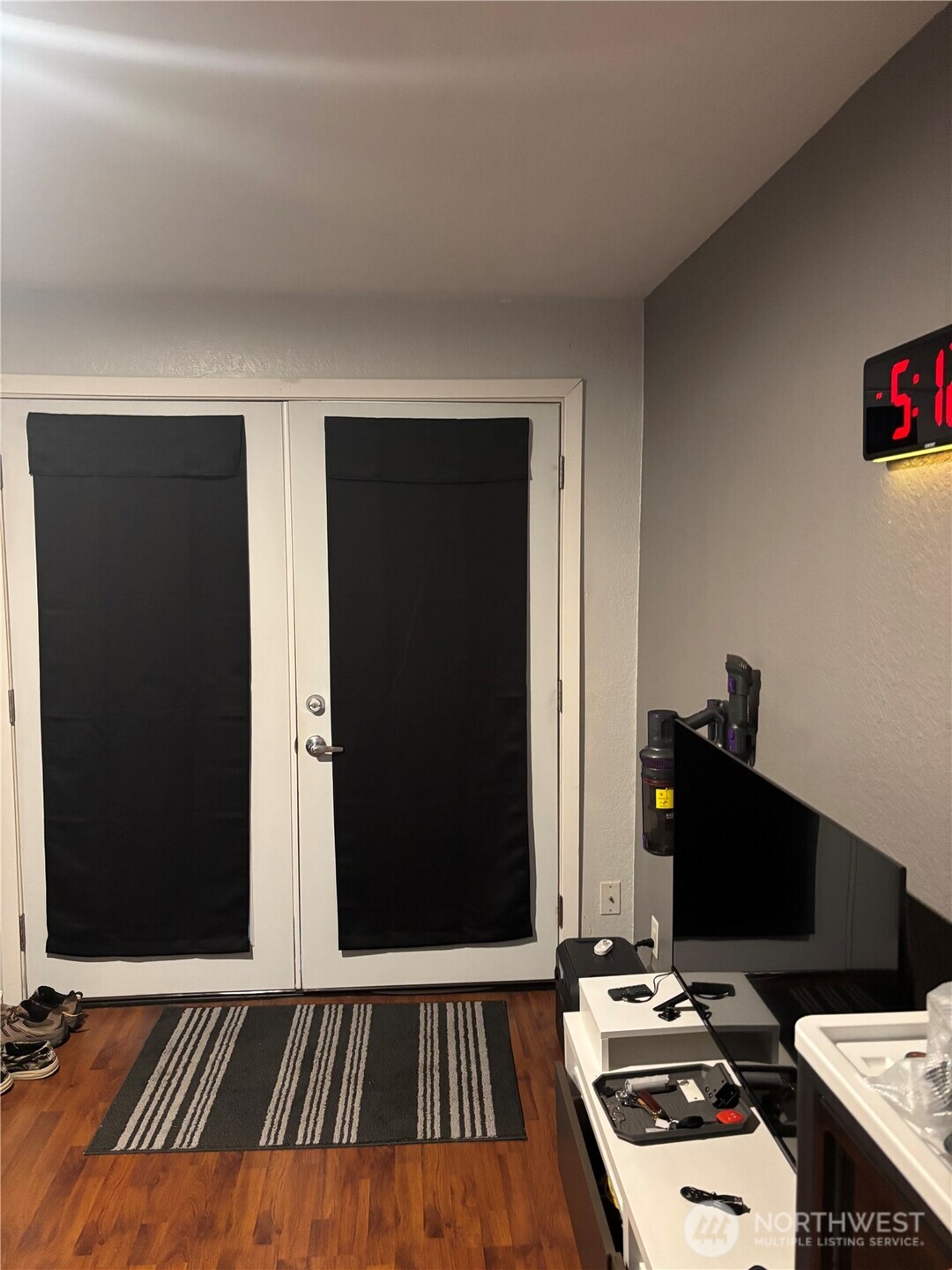 22010 Brier Road Brier, WA 98036 - Photo 21 of 34 a bedroom with a bed and a desk