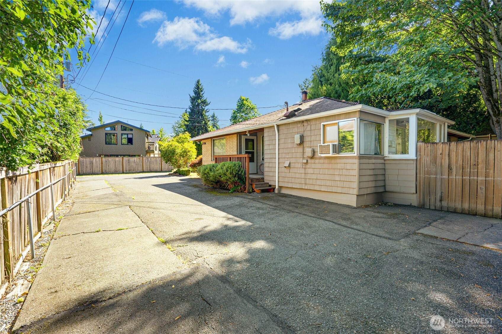 22010 Brier Road Brier, WA 98036 - Photo 30 of 34 a front view of a house with a yard and garage