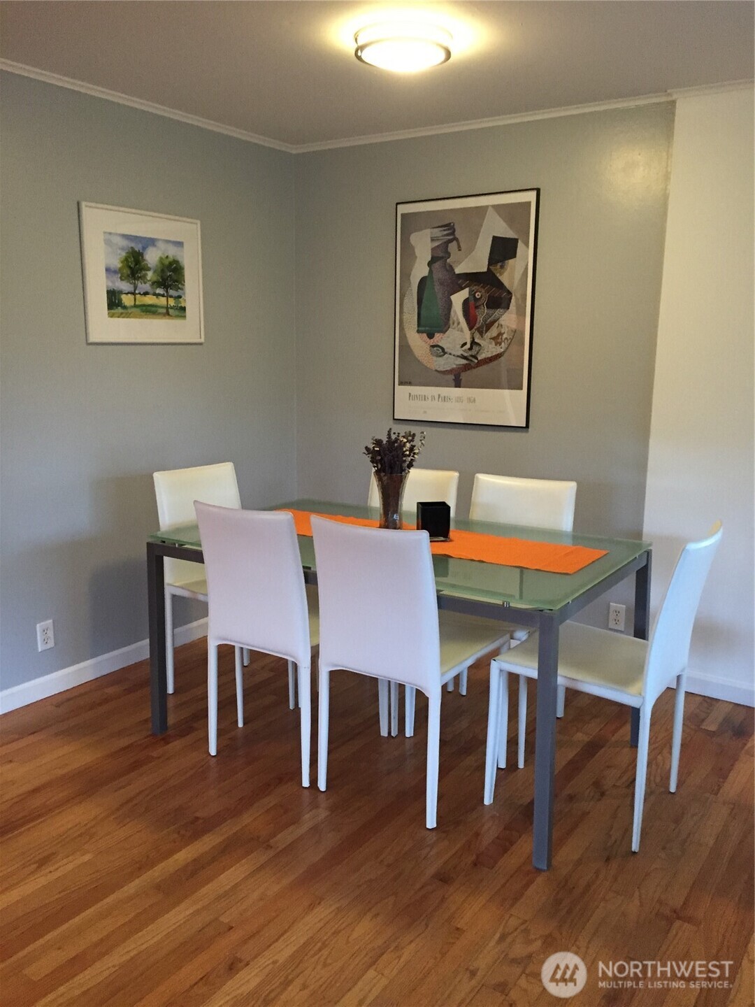 22010 Brier Road Brier, WA 98036 - Photo 8 of 34 a dining room with furniture and wooden floor